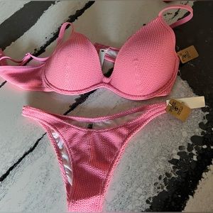 Pink Victoria’s Secret bathing suit bottoms
